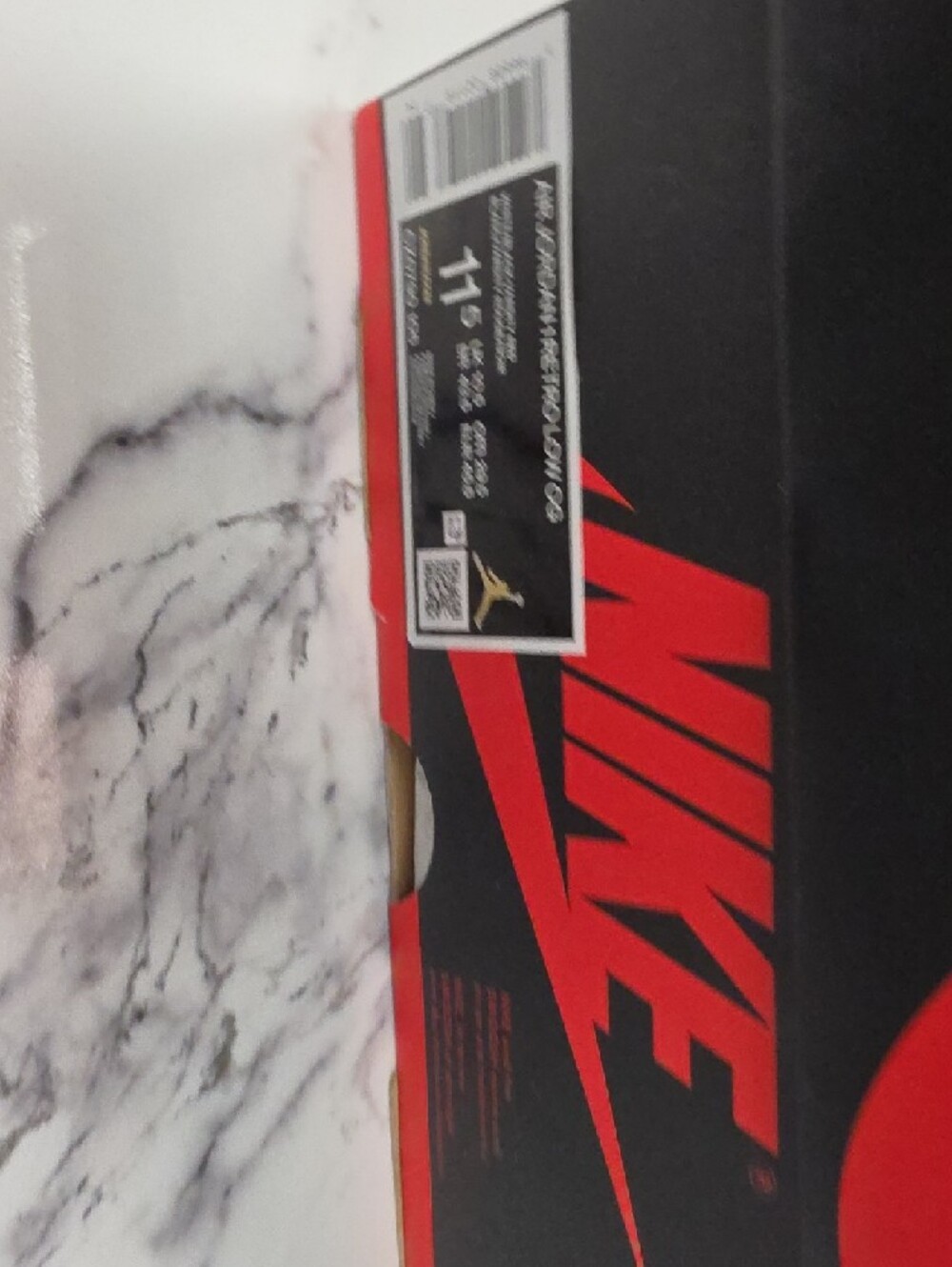 Nike Low-Top Sneakers in Black, White, and Red - Picture 8 of 8